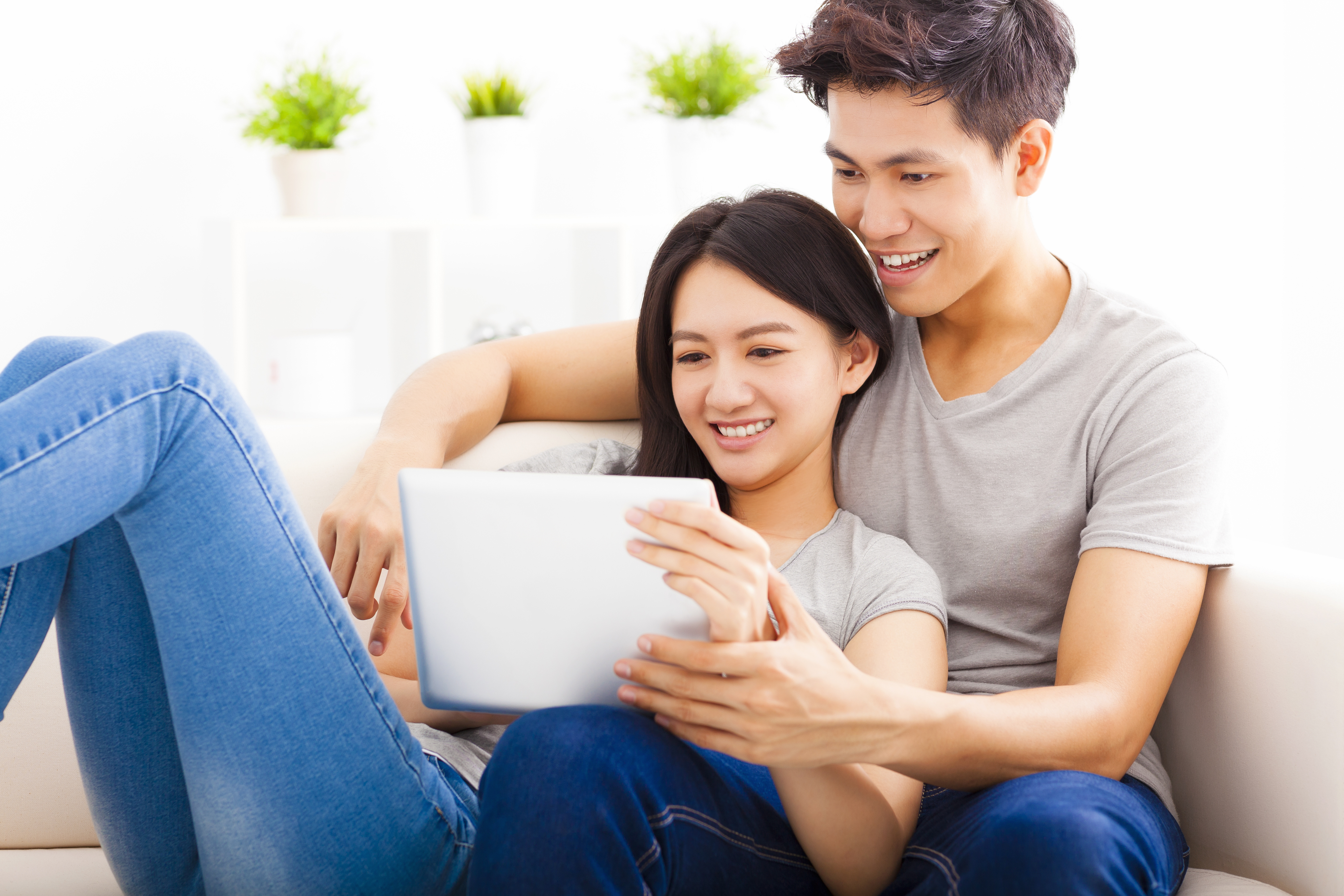 Michael Zakkour Piece- Asian Couple on Tablet