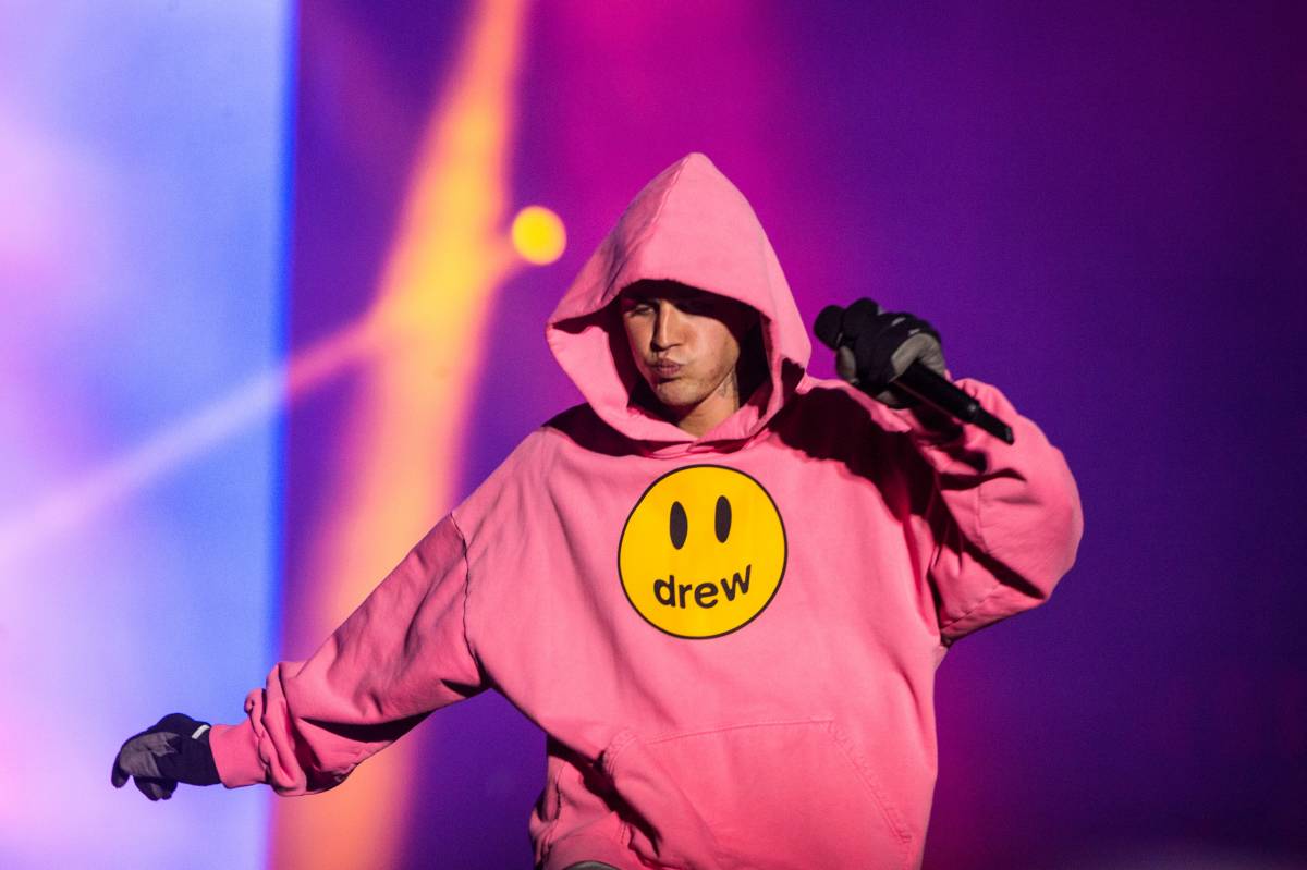 Justin Bieber wearing a Drew House hoodie while performing in Budapest, Hungary. Photo credit: Joseph Okpako, WireImage