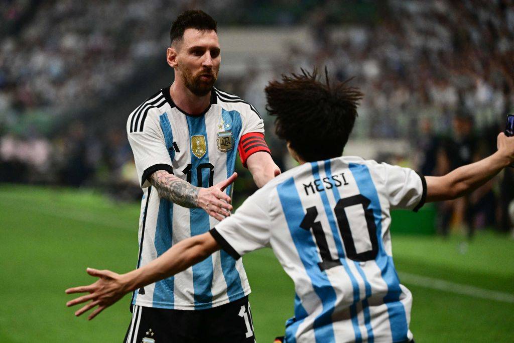 A Fan Runs To Argentina's Lionel Messi During A Friendly Football Match Between Australia And Argentina In Beijing On June 15 2023 during 6.18. Getty